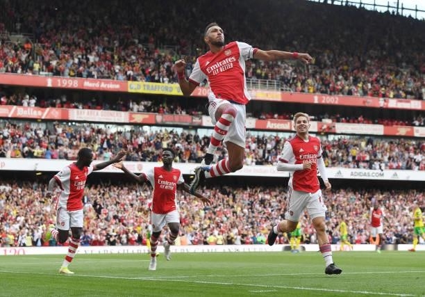 Pierre-Emerick Aubameyang celebrates scoring for Arsenal during the Premier League match between Arsenal and Norwich City at Emirates Stadium on...