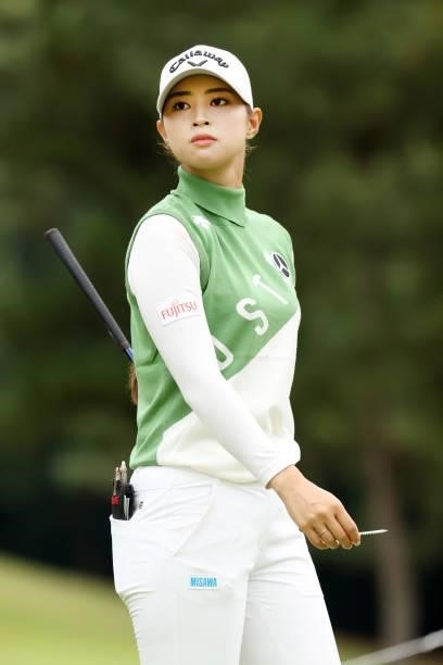 Asuka Kashiwabara of Japan reacts after her tee shot on the 11th hole during the final round of the JLPGA Championship Konica Minolta Cup at Shizu...