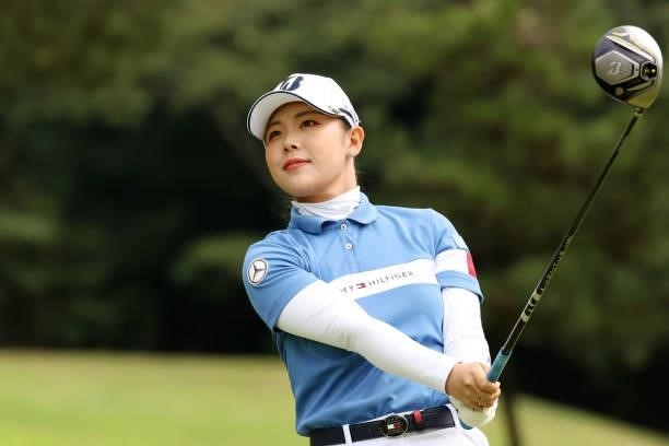 Yuri Yoshida of Japan hits her tee shot on the 11th hole during the final round of the JLPGA Championship Konica Minolta Cup at Shizu Hills Country...