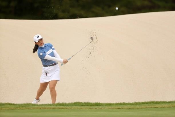 Yuri Yoshida of Japan hits out from a bunker on the 11th hole during the final round of the JLPGA Championship Konica Minolta Cup at Shizu Hills...
