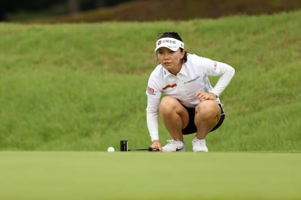 Teresa Lu of Chinese Taipei lines up a putt on the 5th green during the final round of the JLPGA Championship Konica Minolta Cup at Shizu Hills...