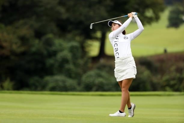 Nozomi Uetake of Japan hits her second shot on the 6th hole during the final round of the JLPGA Championship Konica Minolta Cup at Shizu Hills...