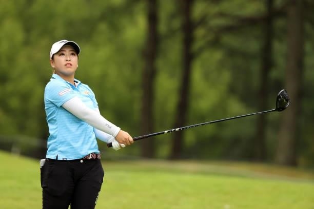 Mao Saigo of Japan hits her tee shot on the 7th hole during the final round of the JLPGA Championship Konica Minolta Cup at Shizu Hills Country Club...
