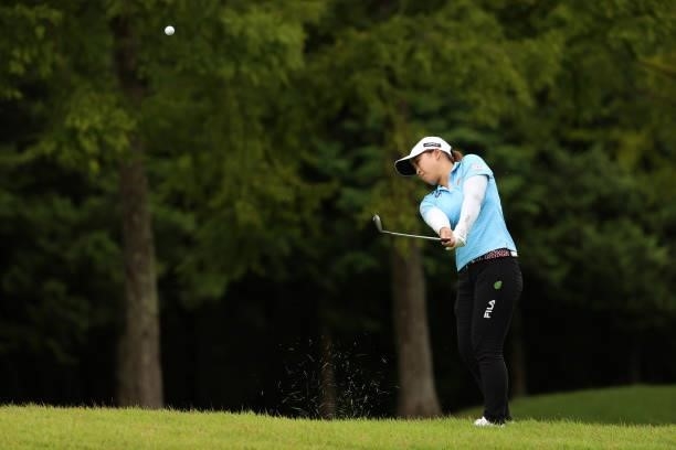 Mao Saigo of Japan hits her third shot on the 11th hole during the final round of the JLPGA Championship Konica Minolta Cup at Shizu Hills Country...