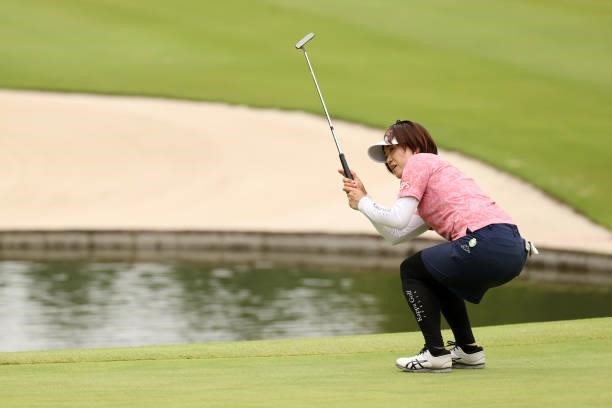 Shiho Oyama of Japan reacts after a putt on the 14th green during the final round of the JLPGA Championship Konica Minolta Cup at Shizu Hills Country...