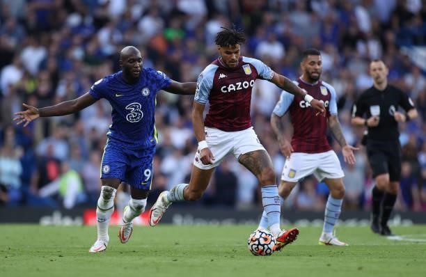 Tyrone Mings of Aston Villa is challenged by Romelu Lukaku of Chelsea during the Premier League match between Chelsea and Aston Villa at Stamford...