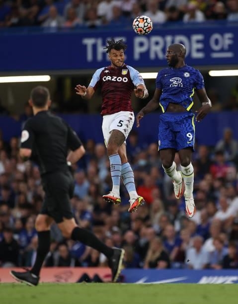 Tyrone Mings of Aston Villa challenges Romelu Lukaku of Chelsea for a header during the Premier League match between Chelsea and Aston Villa at...
