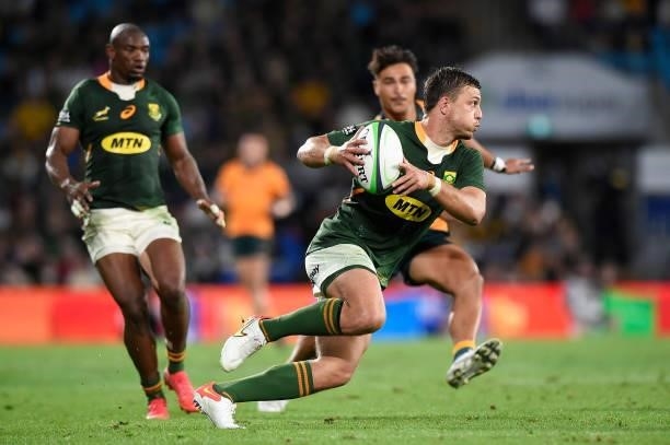 Handré Pollard of the Springboks runs the ball during the Rugby Championship match between the South Africa Springboks and the Australian Wallabies...