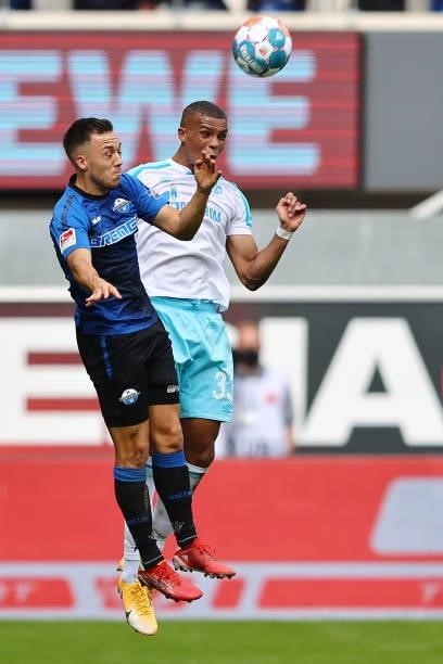 Julian Justvan of Paderborn and Malick Thiaw of Schalke go up for a header during the Second Bundesliga match between SC Paderborn 07 and FC Schalke...