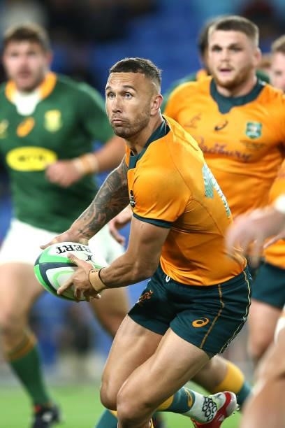 Quade Cooper of the Wallabies passes the ball during the Rugby Championship match between the South Africa Springboks and the Australian Wallabies at...