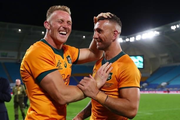 Reece Hodge and Quade Cooper of the Wallabies celebrate winning the Rugby Championship match between the South Africa Springboks and the Australian...