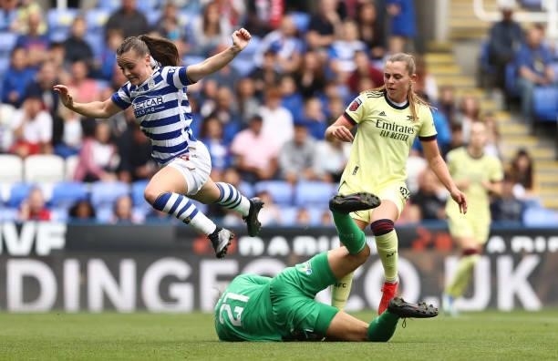 Lily Woodham of Reading evades a tackle from team mate Rhiannon Stewart of Reading during the Barclays FA Women's Super League match between Reading...