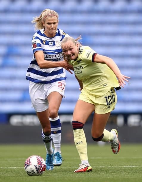 Frida Maanum of Arsenal battles for possession with Justine Vanhaevermaet of Reading during the Barclays FA Women's Super League match between...