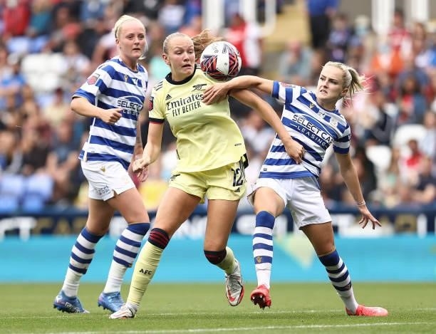 Frida Maanum of Arsenal battles for possession with Faye Bryson of Reading during the Barclays FA Women's Super League match between Reading Women...