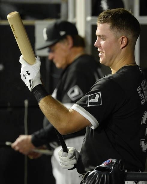 Gavin Sheets of the Chicago White Sox inspects his bat during the game against the Boston Red Sox on September 10, 2021 at Guaranteed Rate Field in...