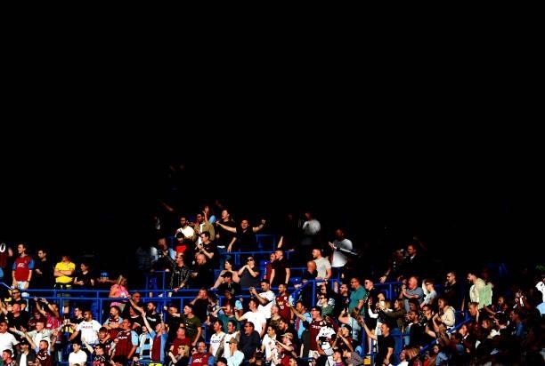 Aston Villa fans look on during the Premier League match between Chelsea and Aston Villa at Stamford Bridge on September 11, 2021 in London, England.