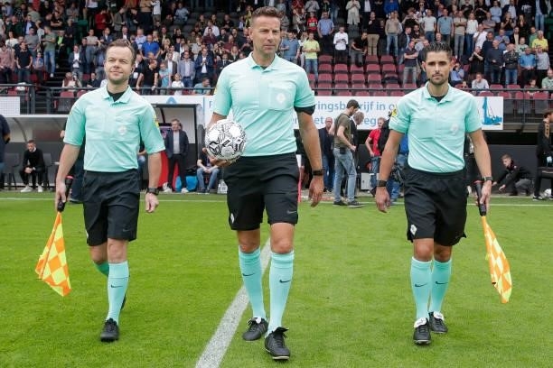 Assistant referee Angelo Boonman, referee Pol van Boekel, assistant referee Martijn Beijer during the Dutch Eredivisie match between N.E.C. And...