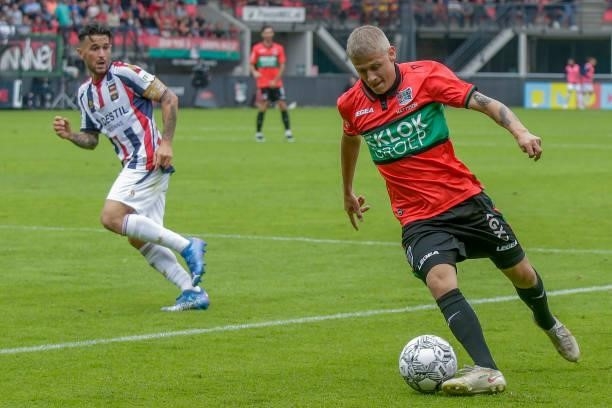 Pol Llonch of Willem II, Magnus Mattsson of N.E.C. During the Dutch Eredivisie match between N.E.C. And Willem II at De Goffert on September 12, 2021...