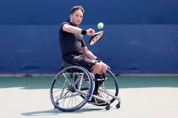 Alfie Hewett of Great Britain returns the ball against Shingo Kunieda of Japan during his Wheelchair Men's Singles final match on Day Fourteen of the...