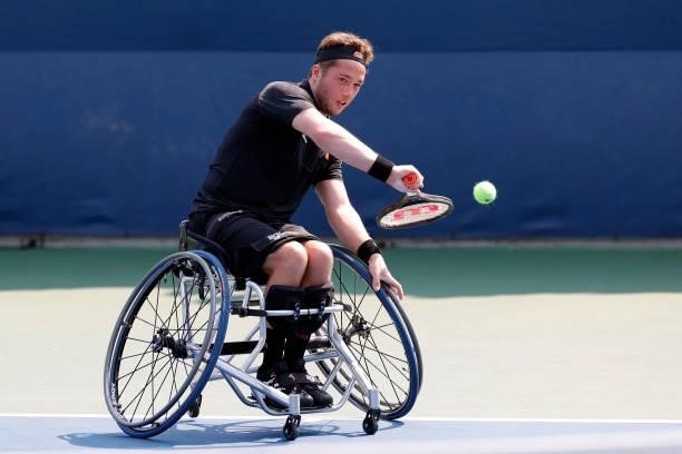Alfie Hewett of Great Britain returns the ball against Shingo Kunieda of Japan during his Wheelchair Men's Singles final match on Day Fourteen of the...