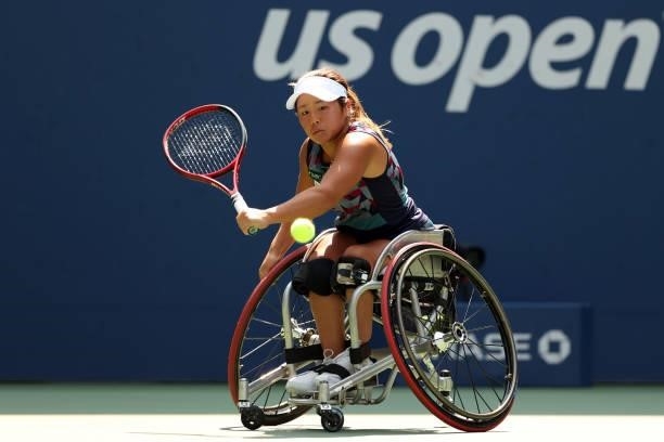 Yui Kamiji of Japan returns the ball against Diede de Groot of the Netherlands during their Wheelchair Women's Singles final match on Day Fourteen of...