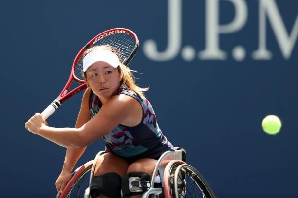 Yui Kamiji of Japan returns the ball against Diede de Groot of the Netherlands during their Wheelchair Women's Singles final match on Day Fourteen of...