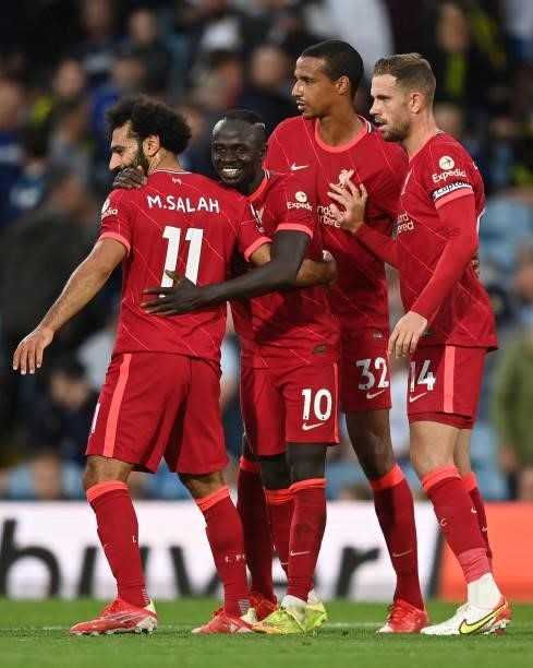 Sadio Mane of Liverpool celebrates with Mohamed Salah after scoring their side's third goal during the Premier League match between Leeds United and...