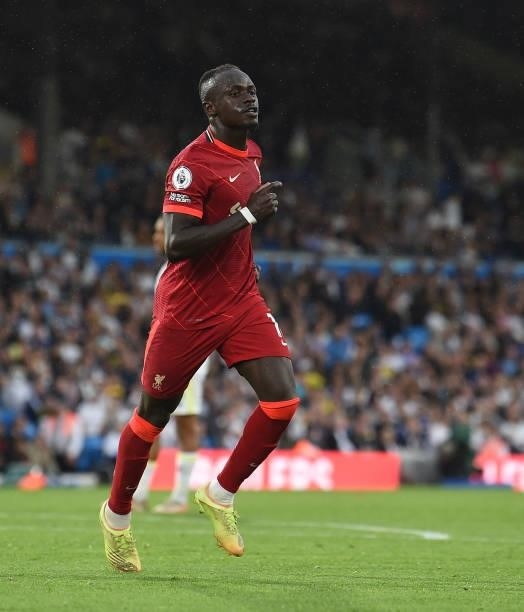 Sadio Mane of Liverpool celebrates after scoring the third goal during the Premier League match between Leeds United and Liverpool at Elland Road on...