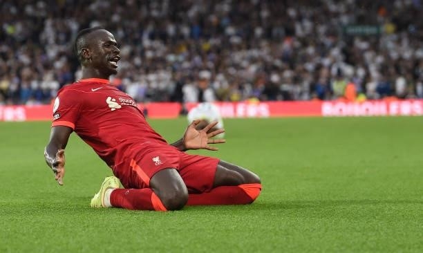 Sadio Mane of Liverpool celebrates after scoring the third goal during the Premier League match between Leeds United and Liverpool at Elland Road on...