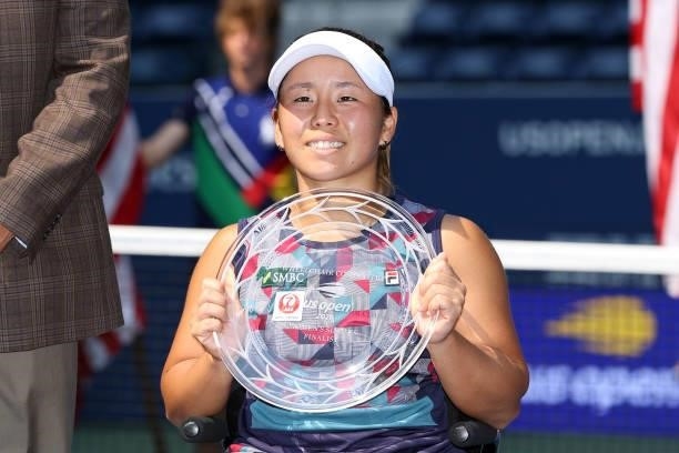 Yui Kamiji of Japan celebrates with the runner-up trophy after being defeated by Diede de Groot of the Netherlands during their Wheelchair Women's...