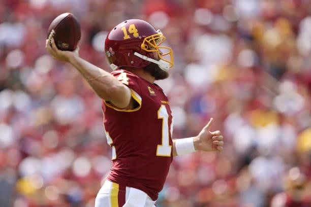 Ryan Fitzpatrick of the Washington Football Team throws a pass against the Los Angeles Chargers during the first half at FedExField on September 12,...
