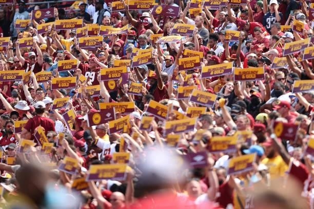 Washington Football Team fans react during the first quarter against the Los Angeles Chargers at FedExField on September 12, 2021 in Landover,...