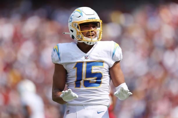 Jalen Guyton of the Los Angeles Chargers celebrates after a reception against the Washington Football Team during the second quarter at FedExField on...