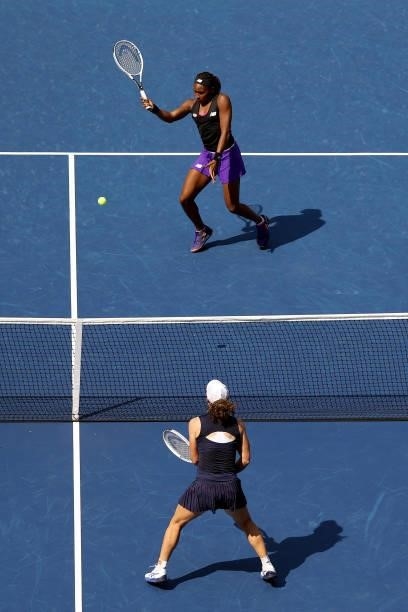 Coco Gauff of the United States and Catherine McNally of the United States return the ball against Samantha Stosur of Australia and Shuai Zhang of...