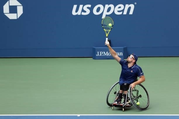 Dylan Alcott of Australia serves the ball against Niels Vink of the Netherlands during their Wheelchair Quad Singles final match on Day Fourteen of...