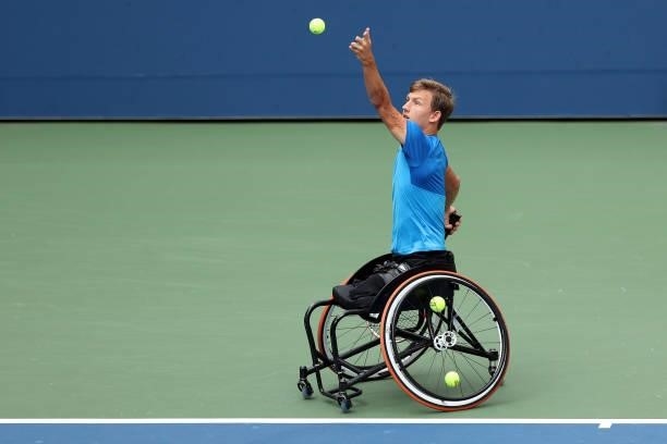 Niels Vink of the Netherlands serves the ball against Dylan Alcott of Australia during their Wheelchair Quad Singles final match on Day Fourteen of...