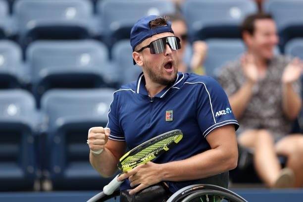 Dylan Alcott of Australia celebrates winning the first set against Niels Vink of the Netherlands during their Wheelchair Quad Singles final match on...