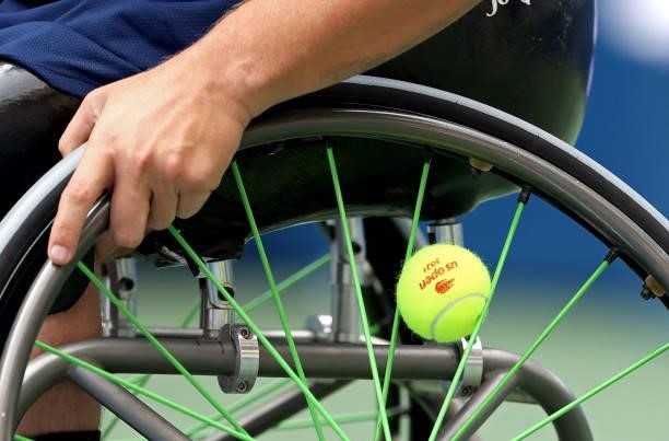 Detailed view of a tennis ball in the wheel of a wheelchair is seen as Dylan Alcott of Australia and Niels Vink of the Netherlands play their...