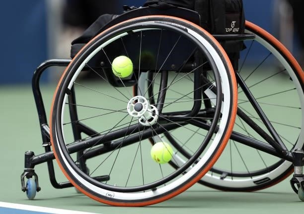 Detailed view of a tennis ball in the wheel of a wheelchair is seen as Dylan Alcott of Australia and Niels Vink of the Netherlands play their...