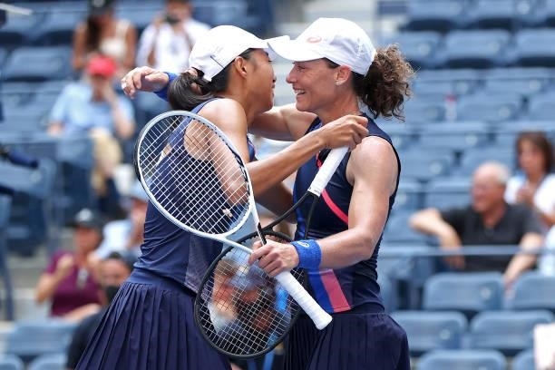 Samantha Stosur of Australia and Shuai Zhang of China celebrate winning championship point against Coco Gauff of the United States and Catherine...