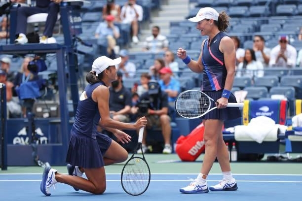 Samantha Stosur of Australia and Shuai Zhang of China celebrate winning championship point against Coco Gauff of the United States and Catherine...