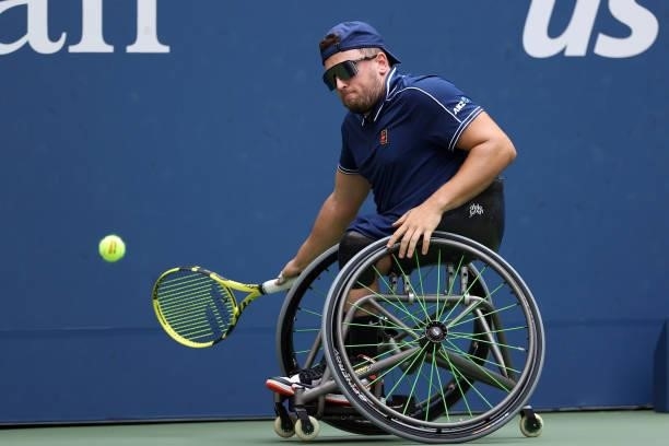 Dylan Alcott of Australia returns against Niels Vink of the Netherlands during their Wheelchair Quad Singles final match on Day Fourteen of the 2021...