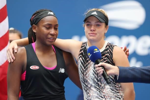 Coco Gauff of the United States and Catherine McNally of the United States react during the trophy ceremony after being defeated by Samantha Stosur...