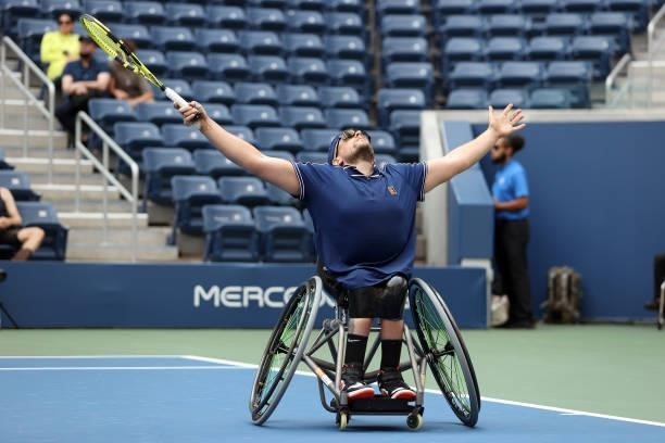 Dylan Alcott of Australia celebrates winning championship point against Niels Vink of the Netherlands during their Wheelchair Quad Singles final...