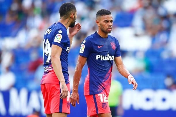 Renan Lodi and Matheus Cunha of Atletico de Madrid speaks during the LaLiga Santander match between RCD Espanyol and Club Atletico de Madrid at RCDE...