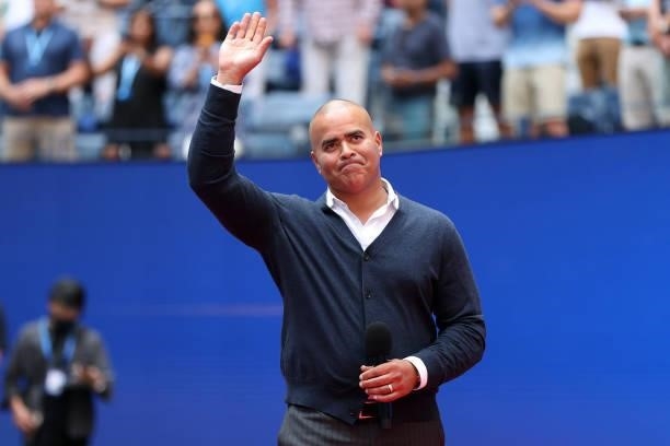 Christopher Jackson waves before performing "America the Beautiful