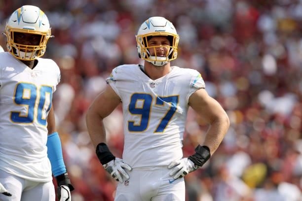 Joey Bosa of the Los Angeles Chargers looks on during the second half against the Washington Football Team at FedExField on September 12, 2021 in...