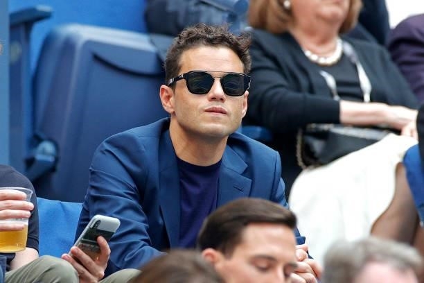 Actor Rami Malek watches the Men's Singles final match between Daniil Medvedev of Russia and Novak Djokovic of Serbia on Day Fourteen of the 2021 US...