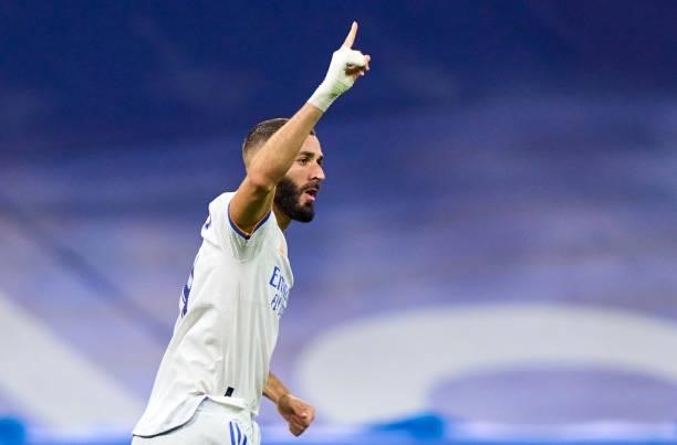 Karim Benzema of Real Madrid CF celebrates after scoring his team's second goal during the La Liga Santander match between Real Madrid CF and RC...
