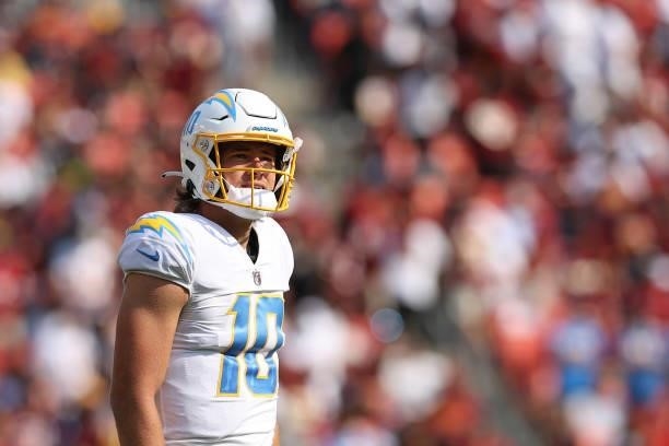 Justin Herbert of the Los Angeles Chargers looks on during the game against the Washington Football Team at FedExField on September 12, 2021 in...